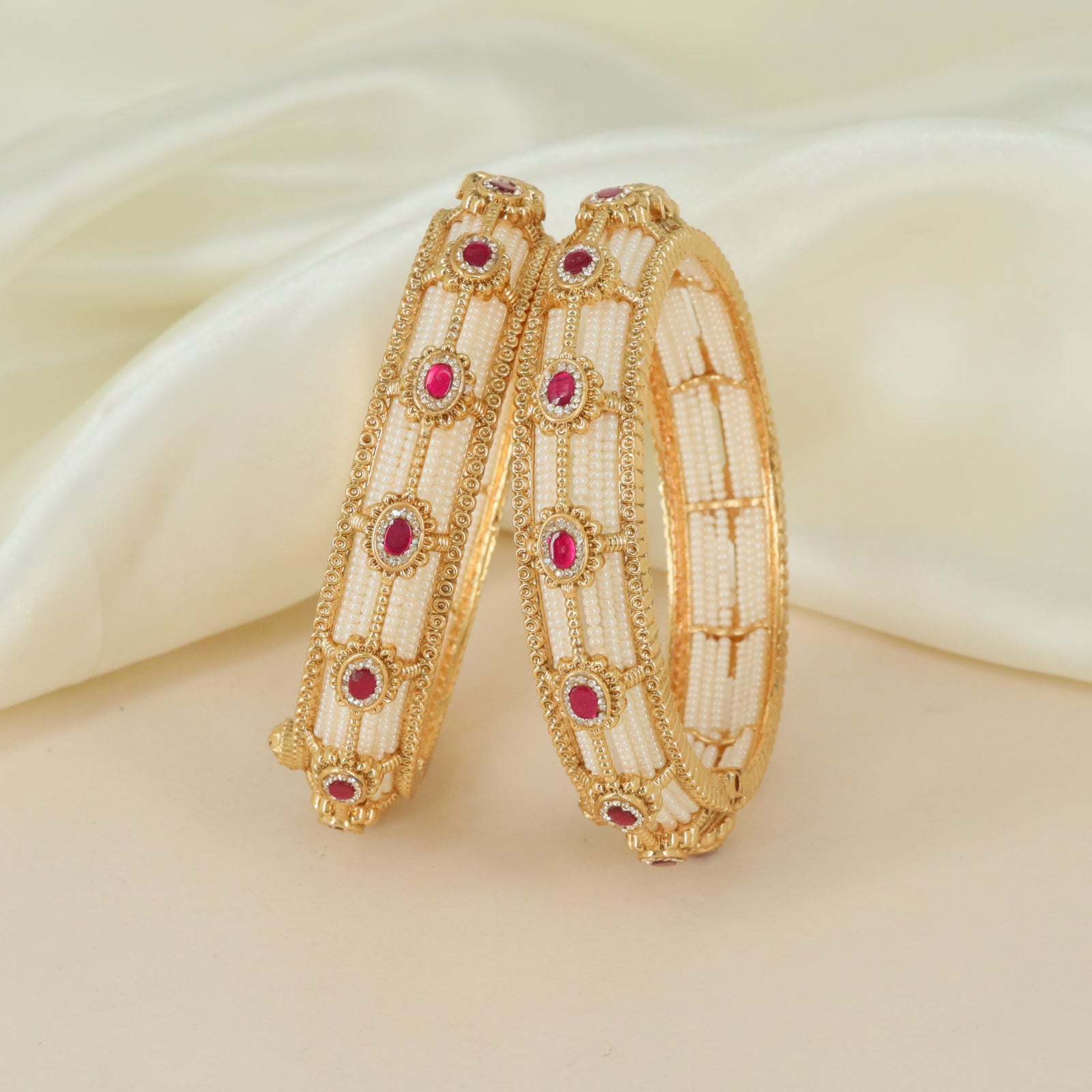 Embossed motif artistry Antique bangles with ornamental detailing