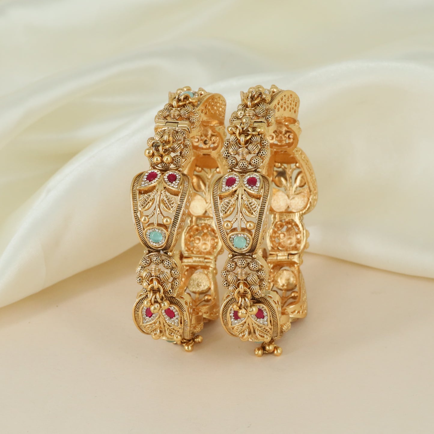 Premium crafted detailing Antique bangles with layered artistry