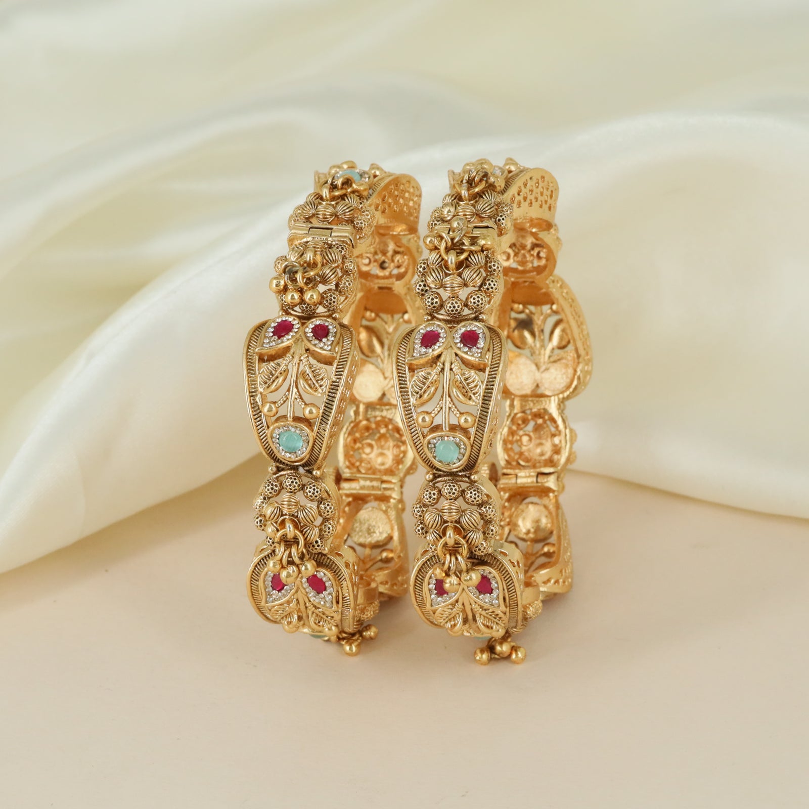 Premium crafted detailing Antique bangles with layered artistry
