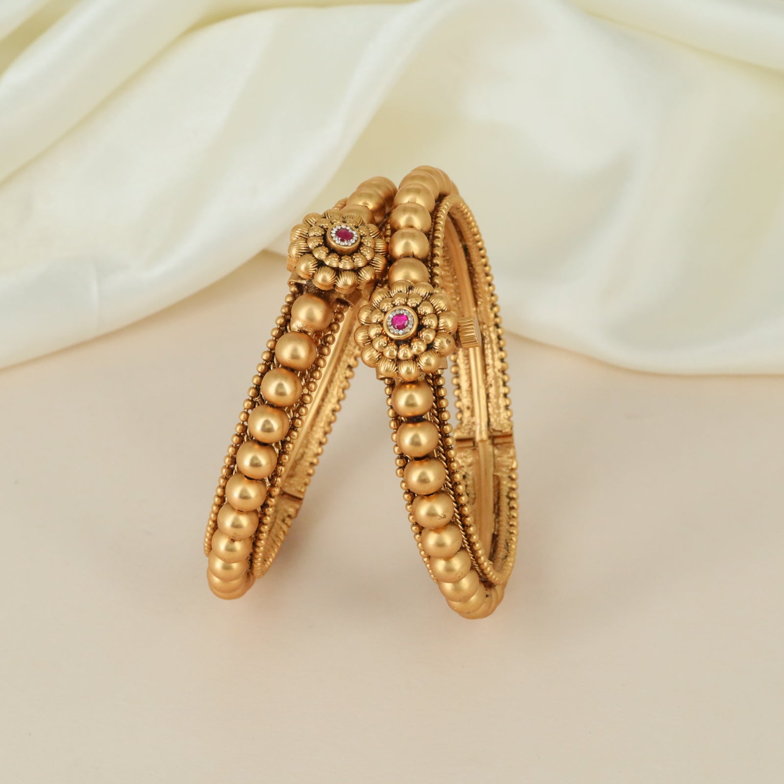 Regal Bead Border Antique Bangles with Floral Medallion Detailing