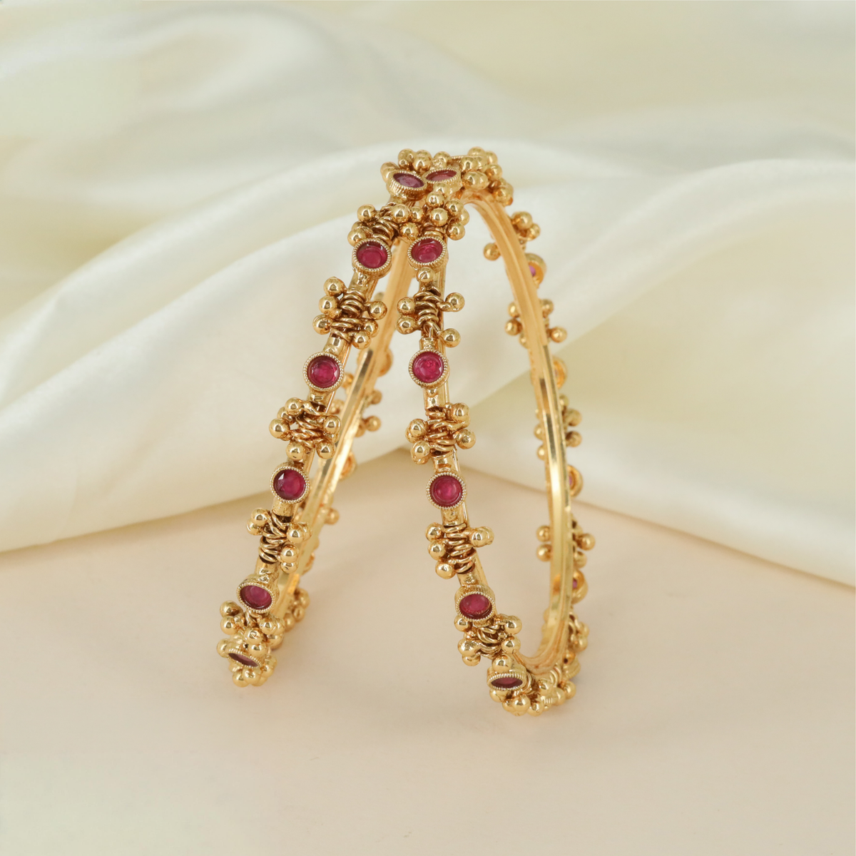Antique Bangles With Repeated Round Settings And Intricate Beaded Clusters