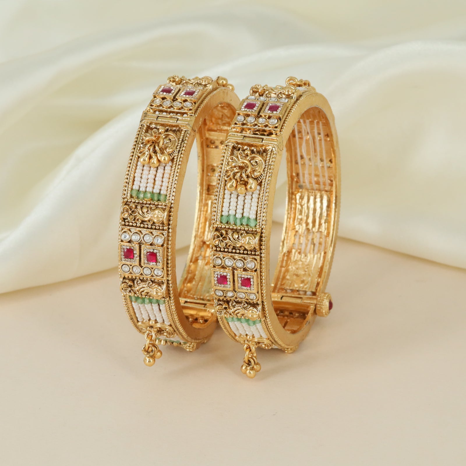 Leaf inspired design Kundan bangles with decorative borders