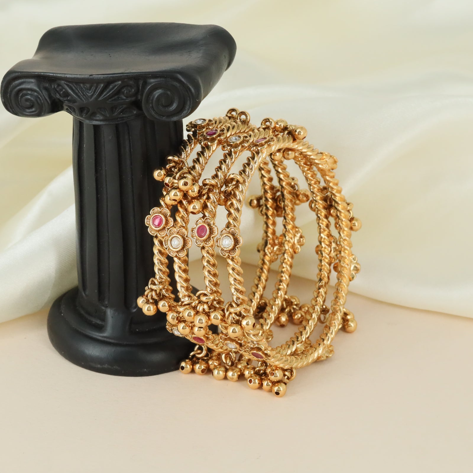 Twisted rope artistry Antique bangles with ornamental detailing
