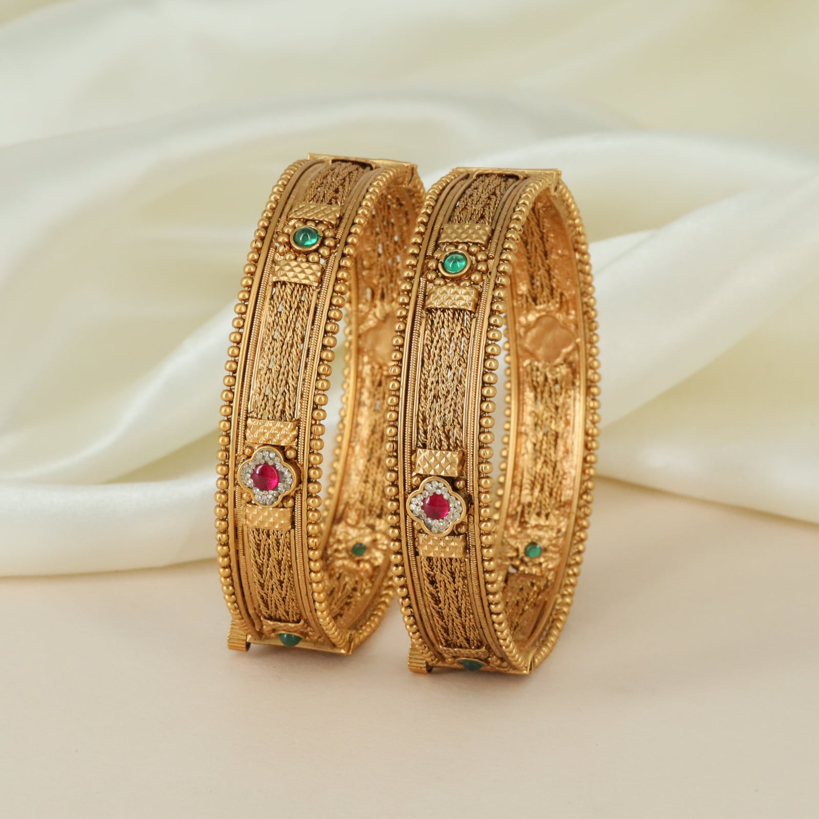 Majestic gold-tone structured kadas with symmetrical relief links