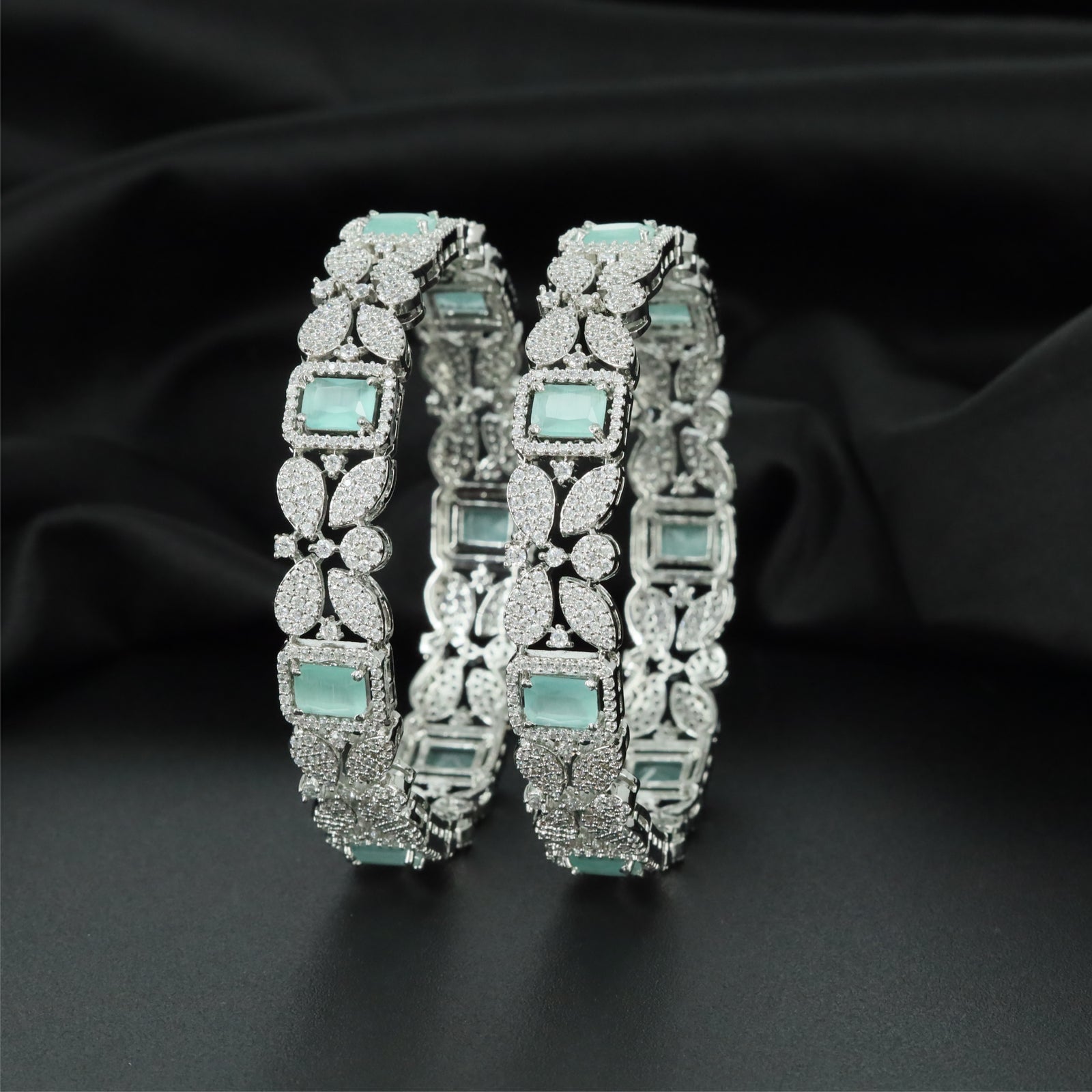 Facet Leaf Rhodium Bangles with Rectangular Centre Alignment