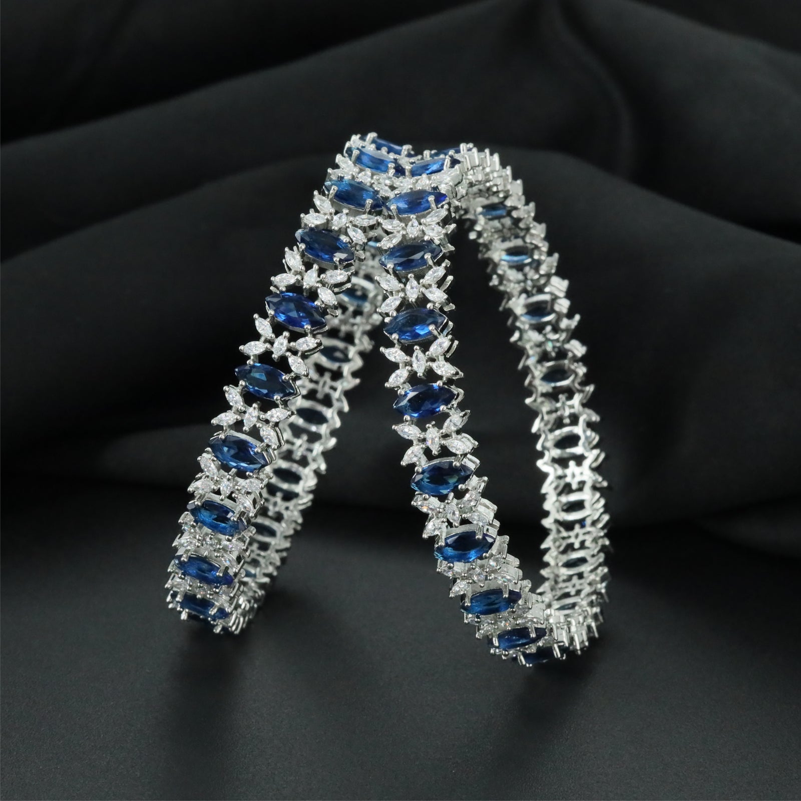 Multi Section Rhodium Bangles with Refined Architectural Structure