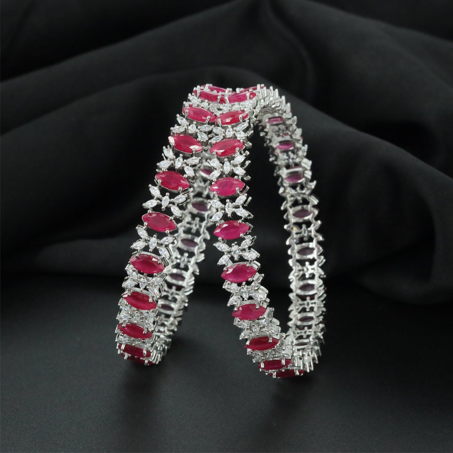 Leaf Pattern Rhodium Bangles with Detailed Connector Formation