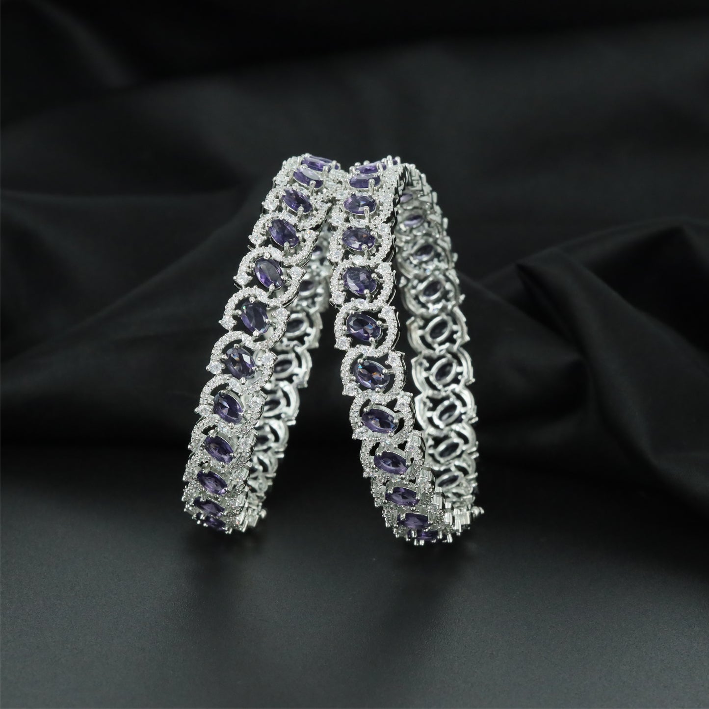 Contour Orbit Rhodium Bangles with Refined Structural Pattern