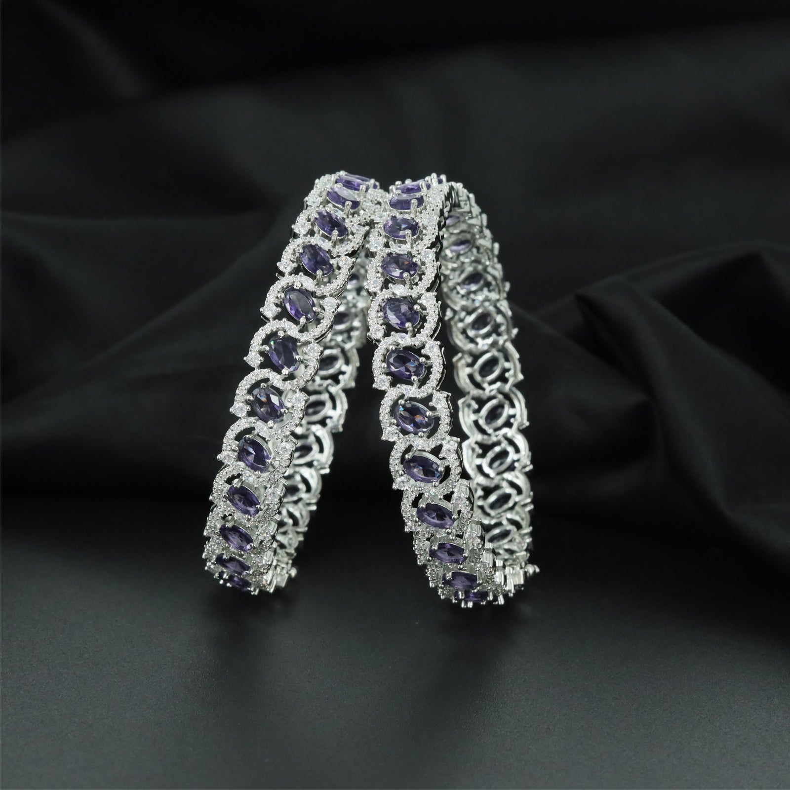 Contour Orbit Rhodium Bangles with Refined Structural Pattern