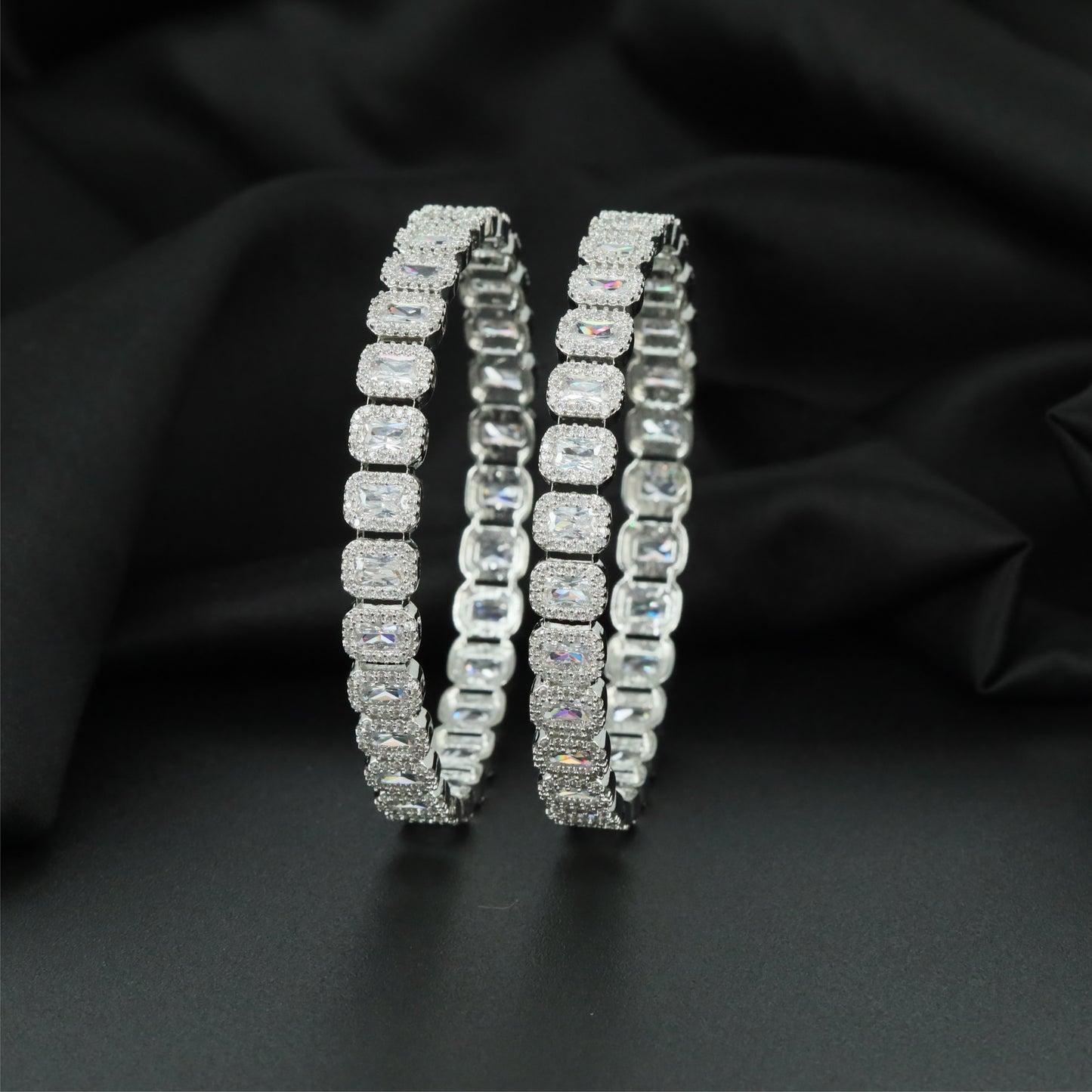 Riviera Facet Rhodium Bangles with Continuous Halo Arrangement