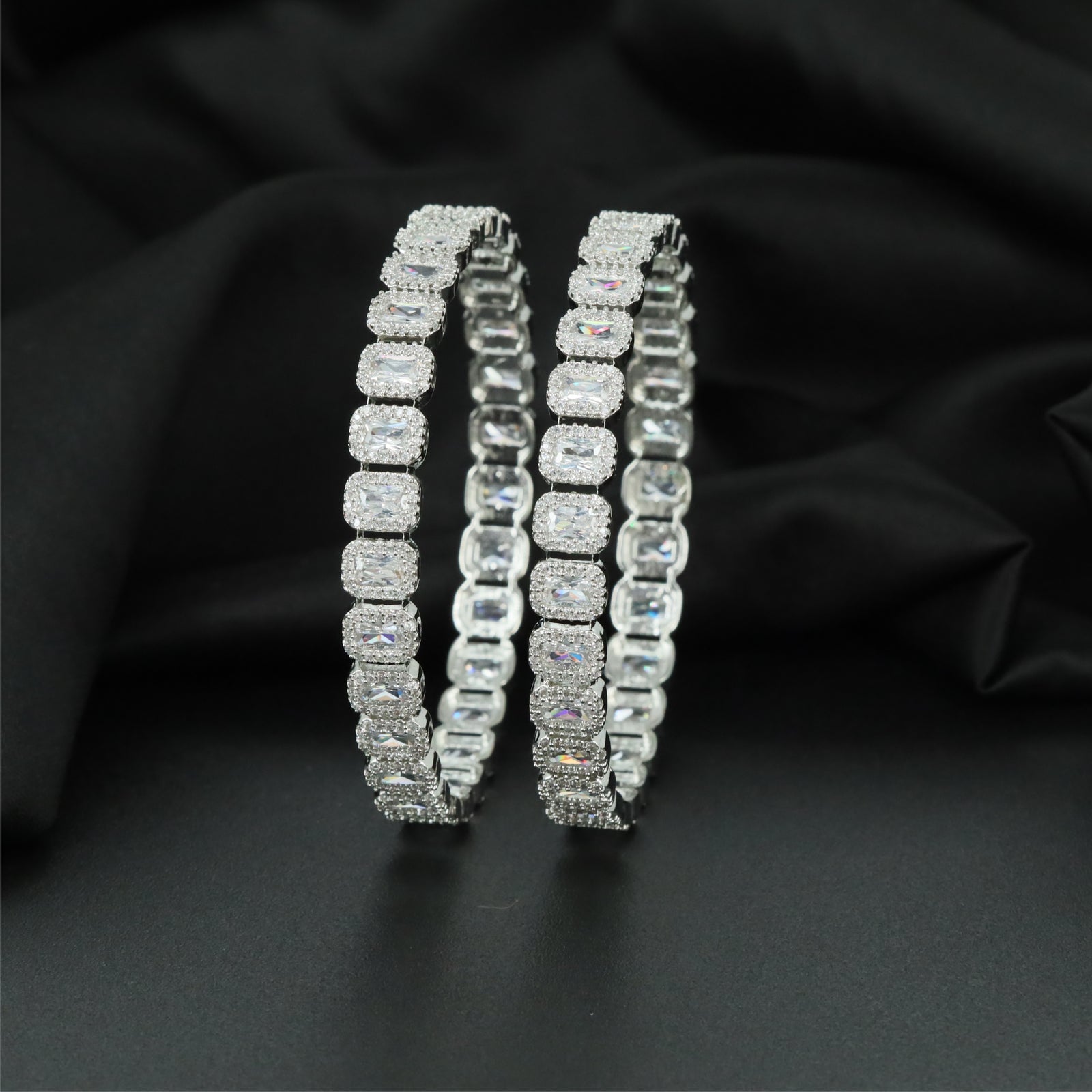 Riviera Facet Rhodium Bangles with Continuous Halo Arrangement