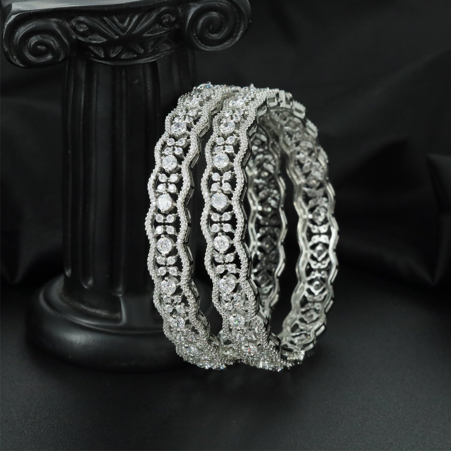 Aurora Link Rhodium Bangles with Structured Floral Alignment