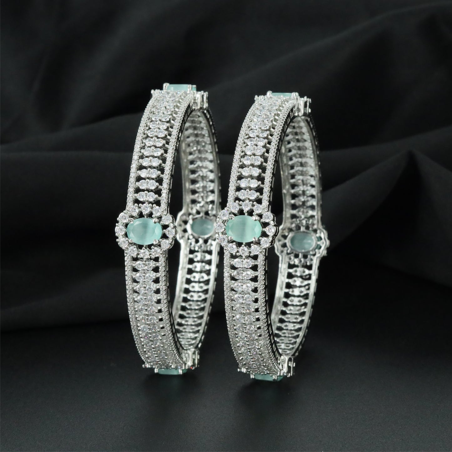 Aurelia Centre Accent Rhodium Bangles with Multi Row Border Detailing
