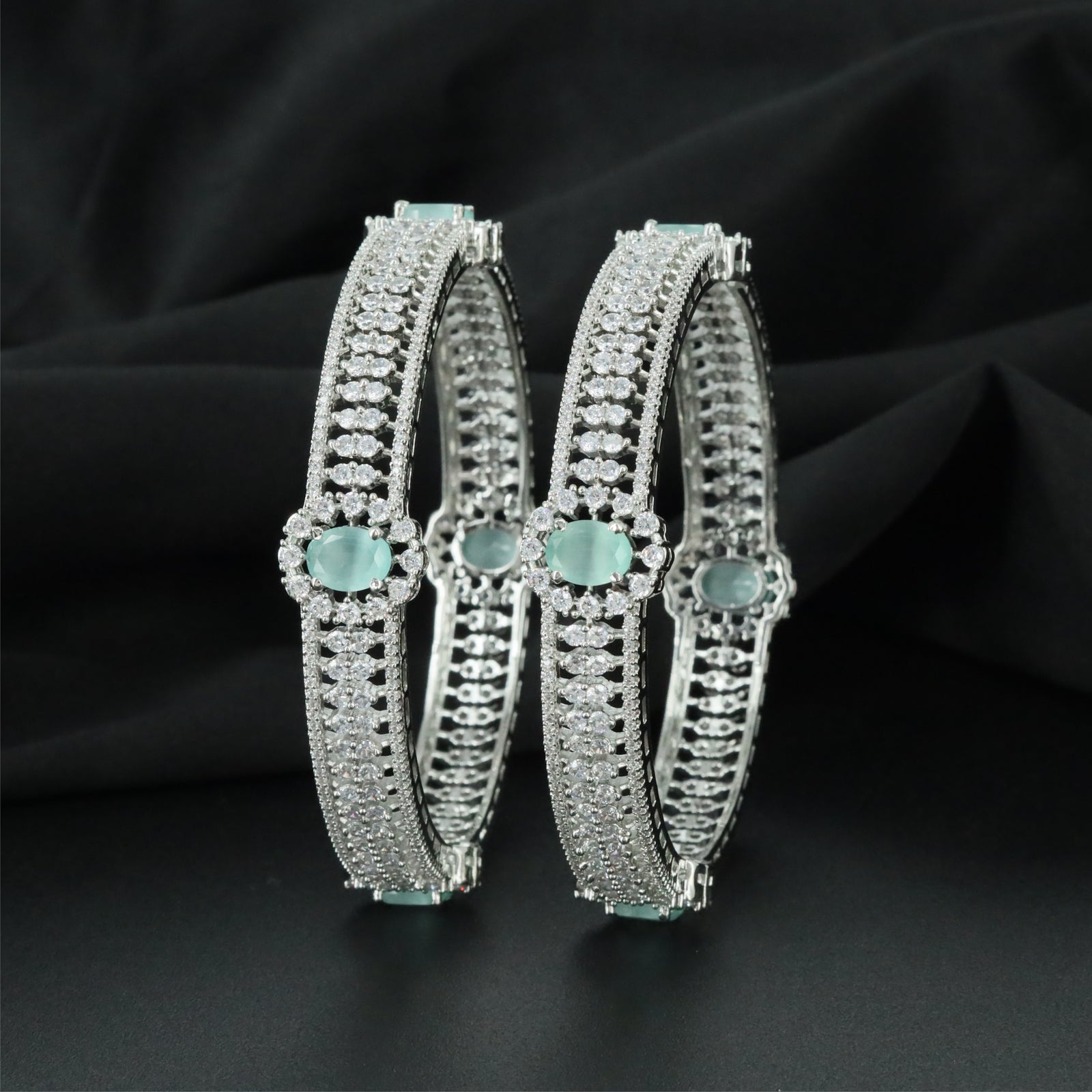 Aurelia Centre Accent Rhodium Bangles with Multi Row Border Detailing