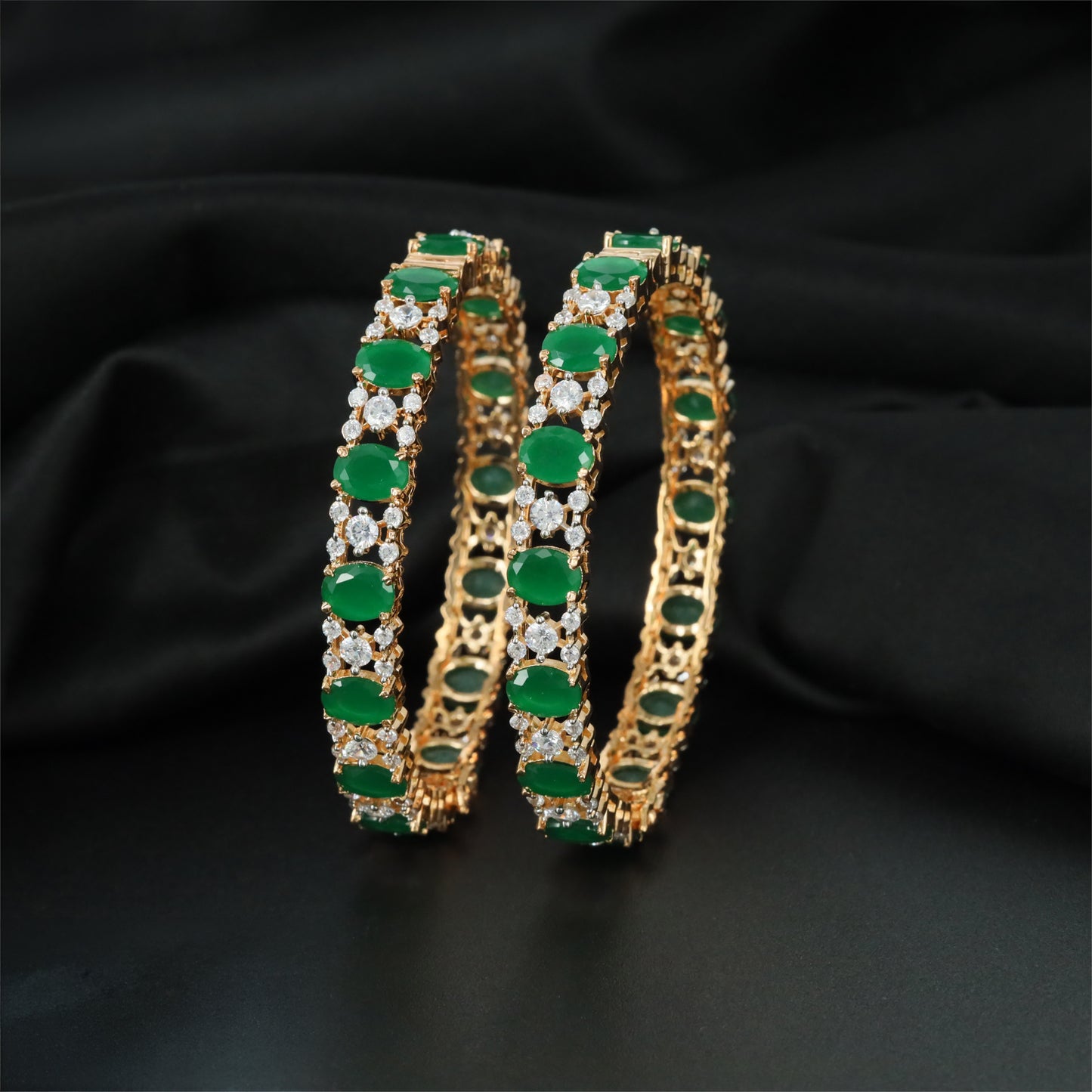 Graceful GJ Bangles Featuring Oval Settings and Petal Clusters
