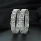 Refined Rhodium Bangles with Alternating Oval and Floral Forms
