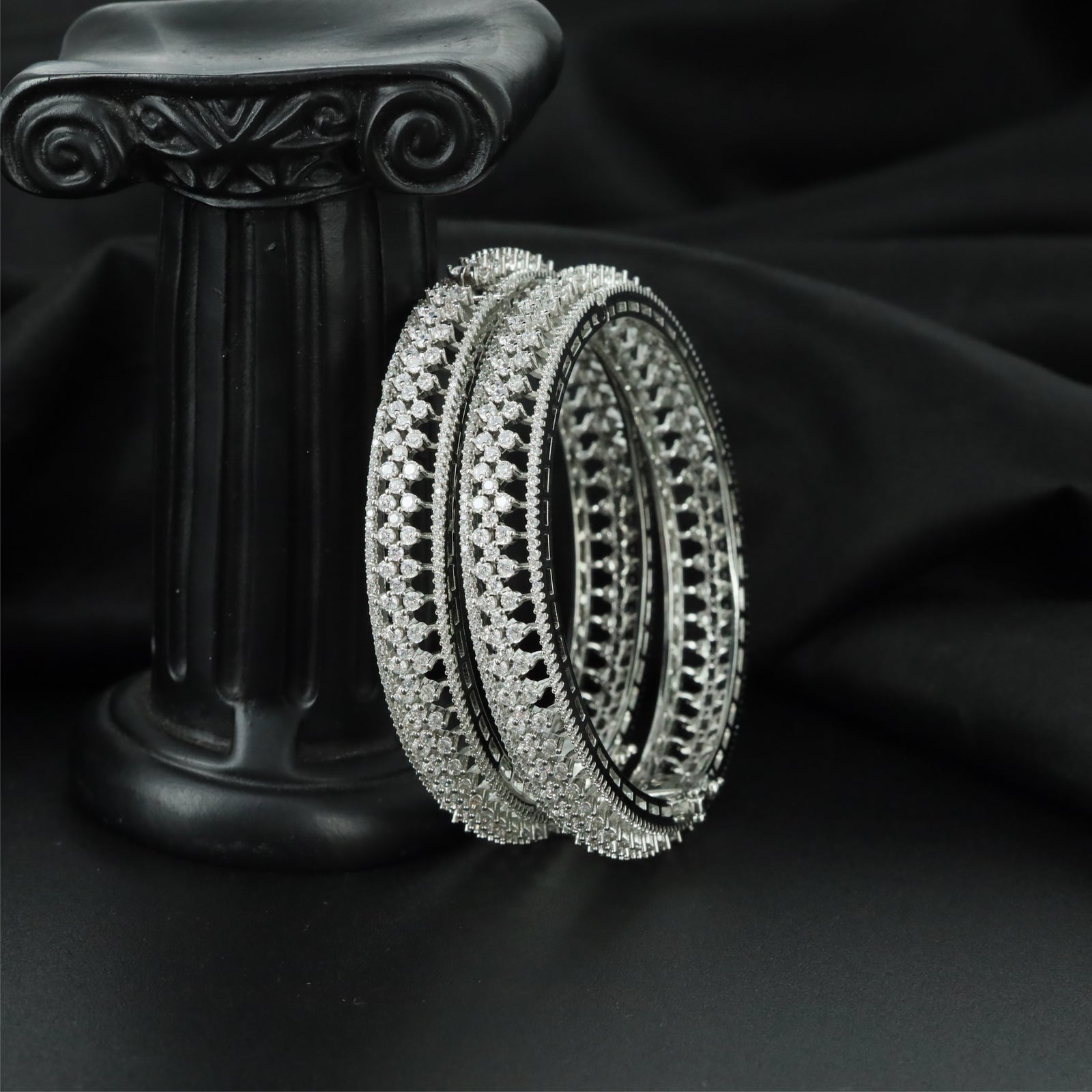 Elite Border Track Rhodium Bangles with Intricate Open Sections