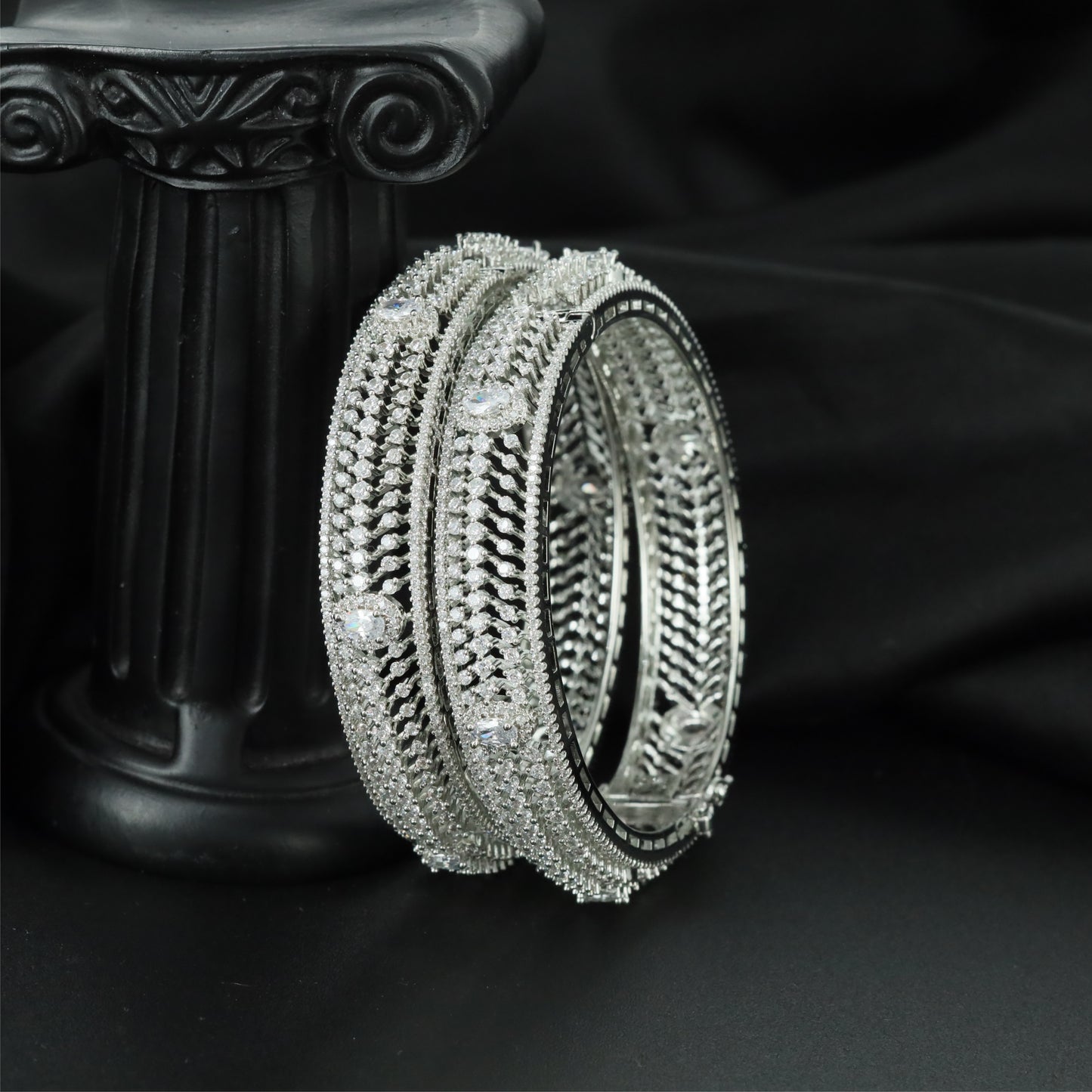 Intricate Texture Flow Rhodium Bangles with Sculpted Band Construction