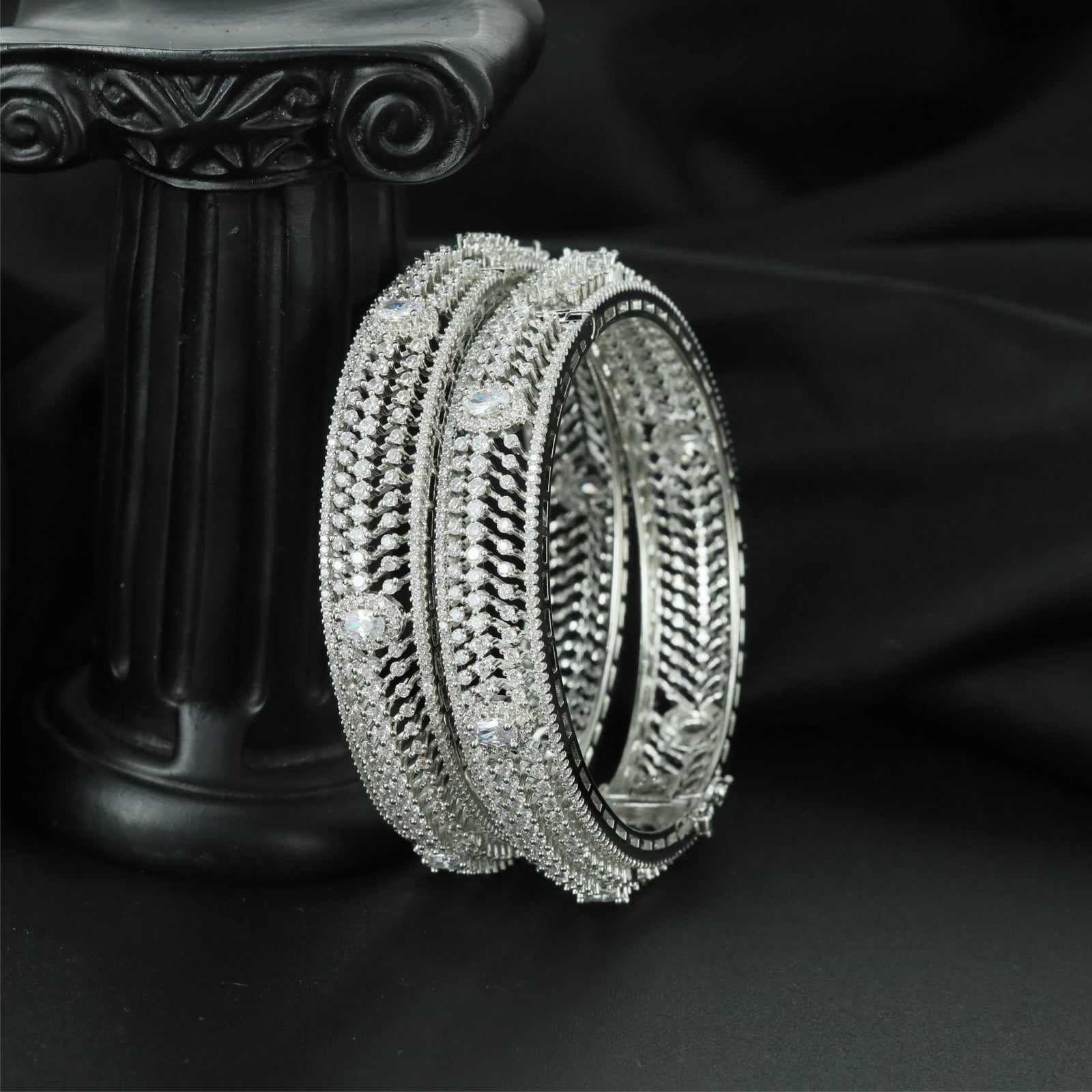 Intricate Texture Flow Rhodium Bangles with Sculpted Band Construction