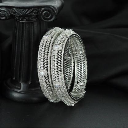 Intricate Texture Flow Rhodium Bangles with Sculpted Band Construction