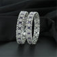 Refined Rhodium Bangles with Alternating Oval and Floral Forms