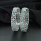 Refined Rhodium Bangles with Alternating Oval and Floral Forms