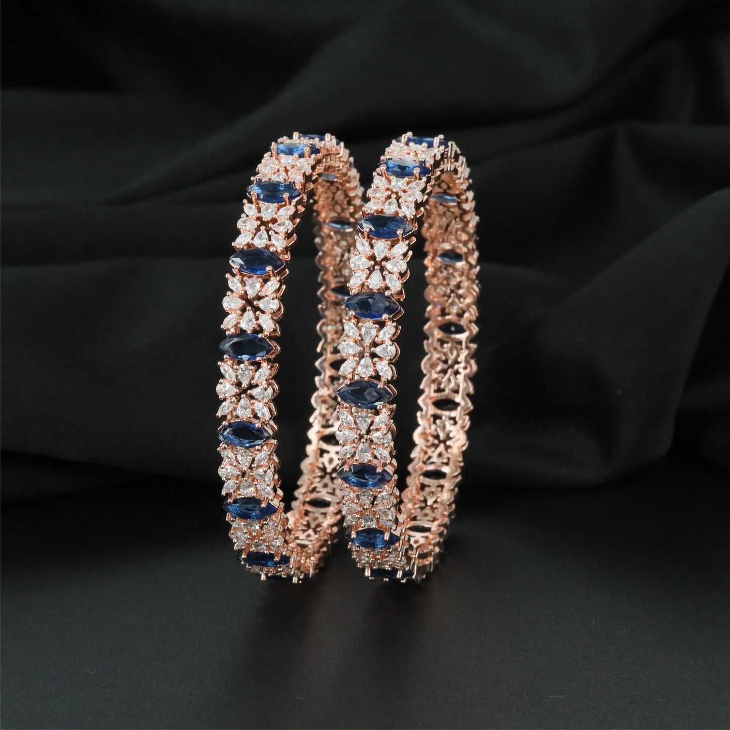 Elaborate Rose Gold Bangles Designed with Oval Panels and Petal Forms