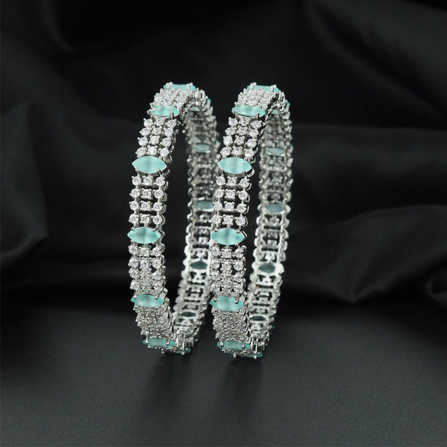 Radiant Interlock Rhodium Bangles with Multi Section Construction