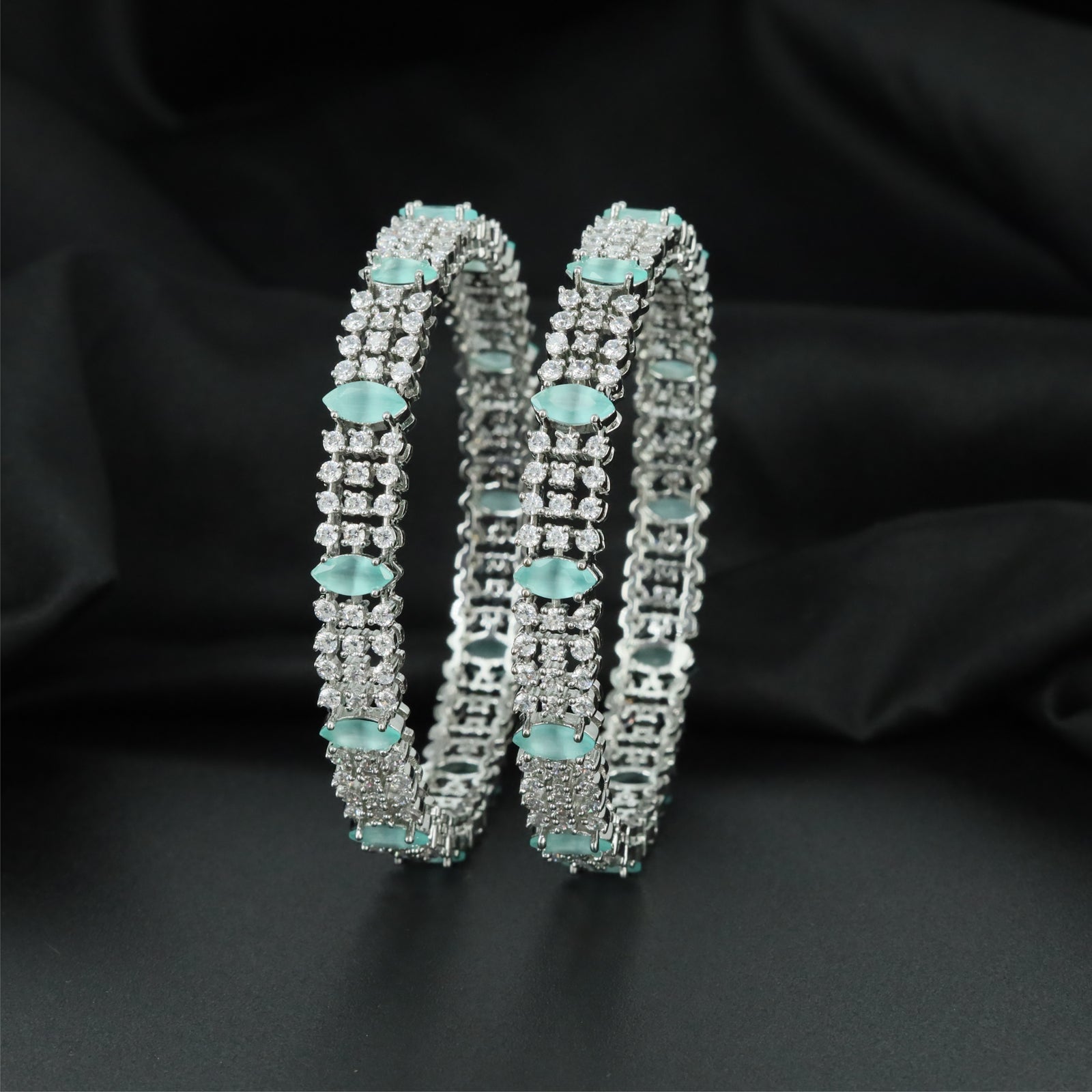 Radiant Interlock Rhodium Bangles with Multi Section Construction