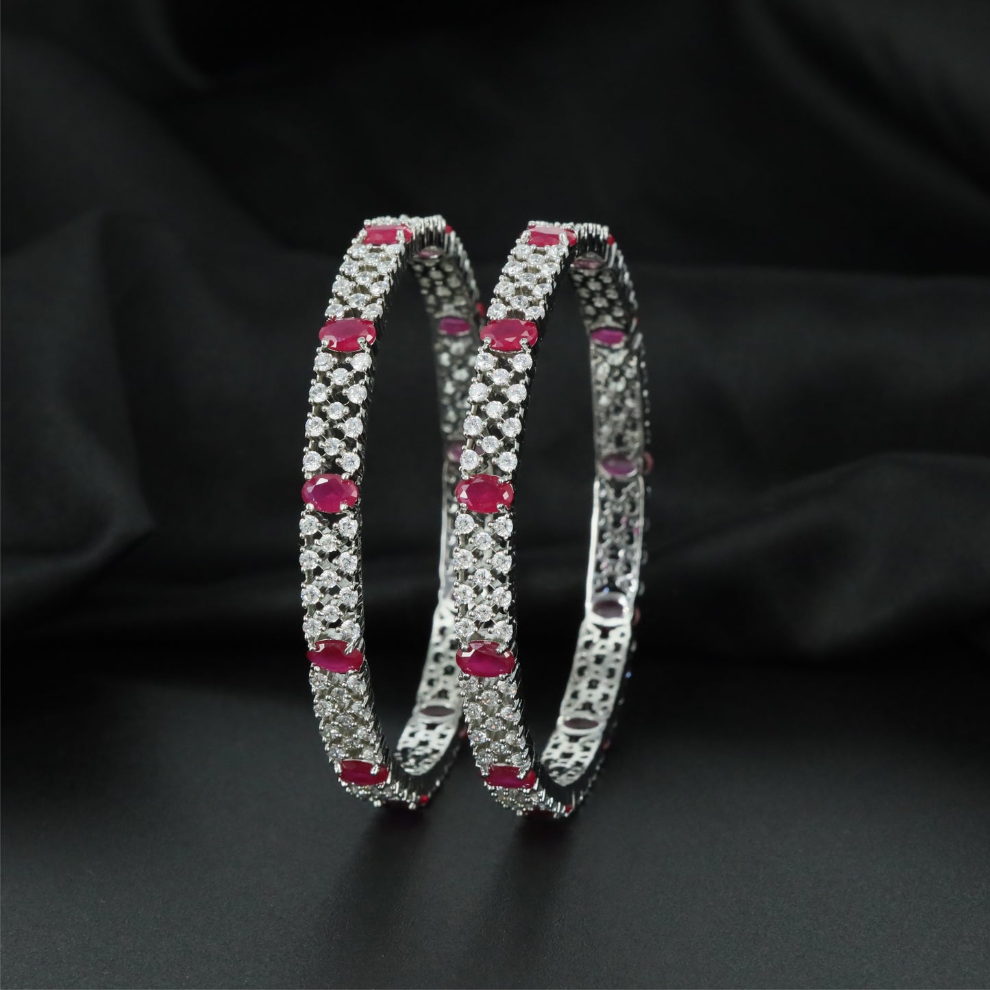 Elite Network Rhodium Bangles with Repeating Frame Formation