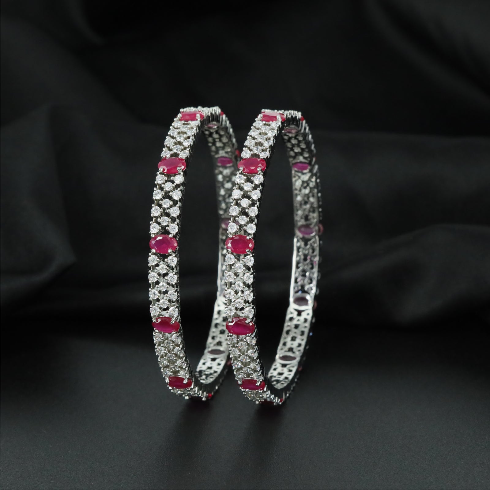 Elite Network Rhodium Bangles with Repeating Frame Formation