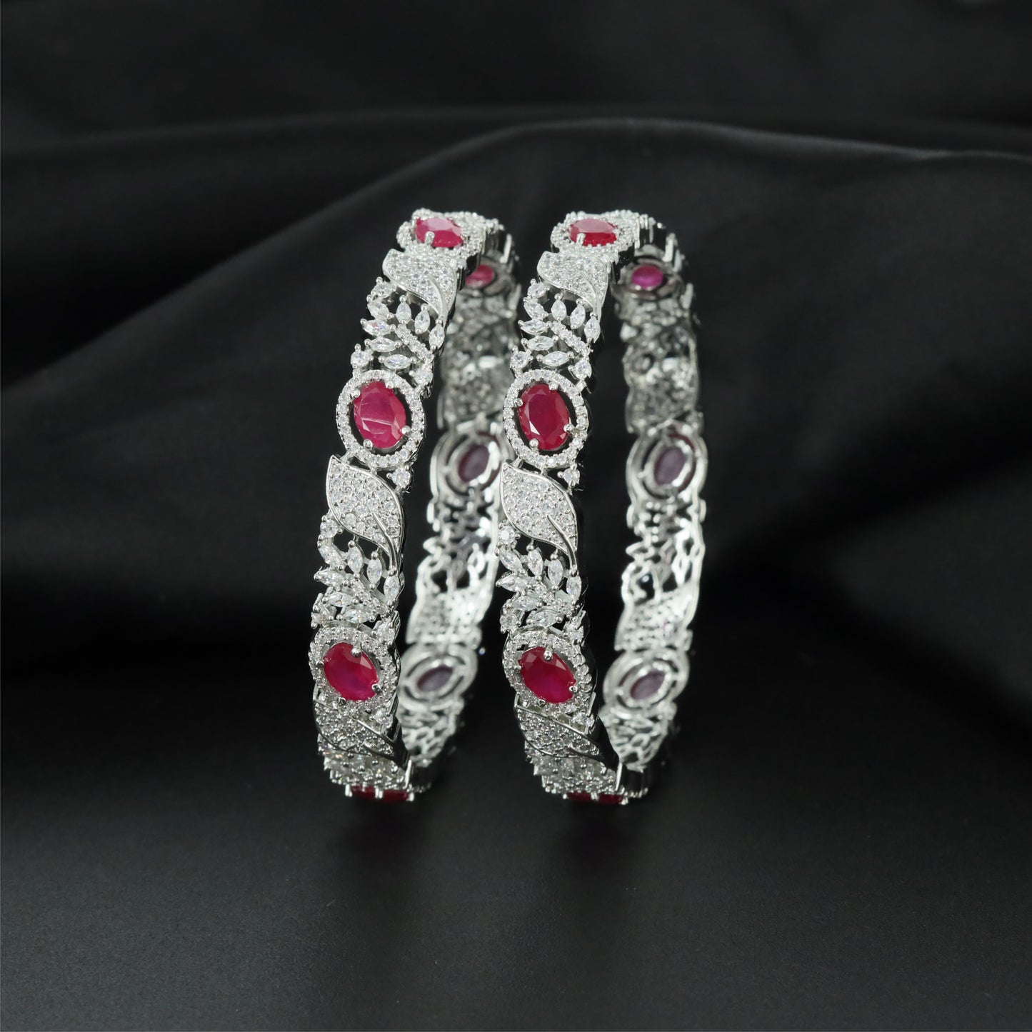Willow Leaf Rhodium Bangles with Ornamental Framework Construction