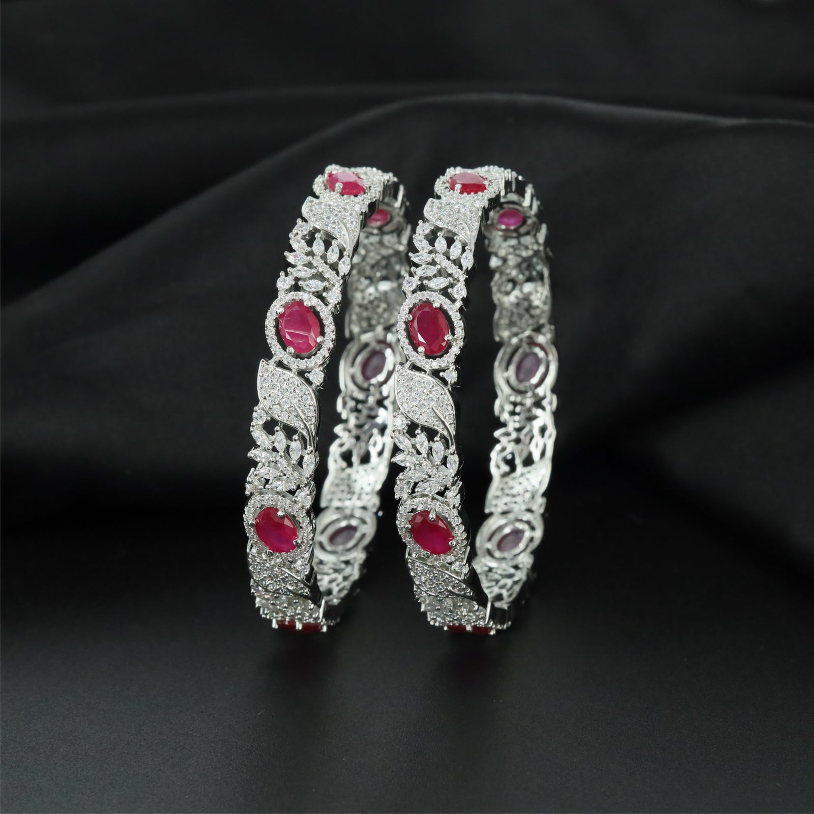 Willow Leaf Rhodium Bangles with Ornamental Framework Construction