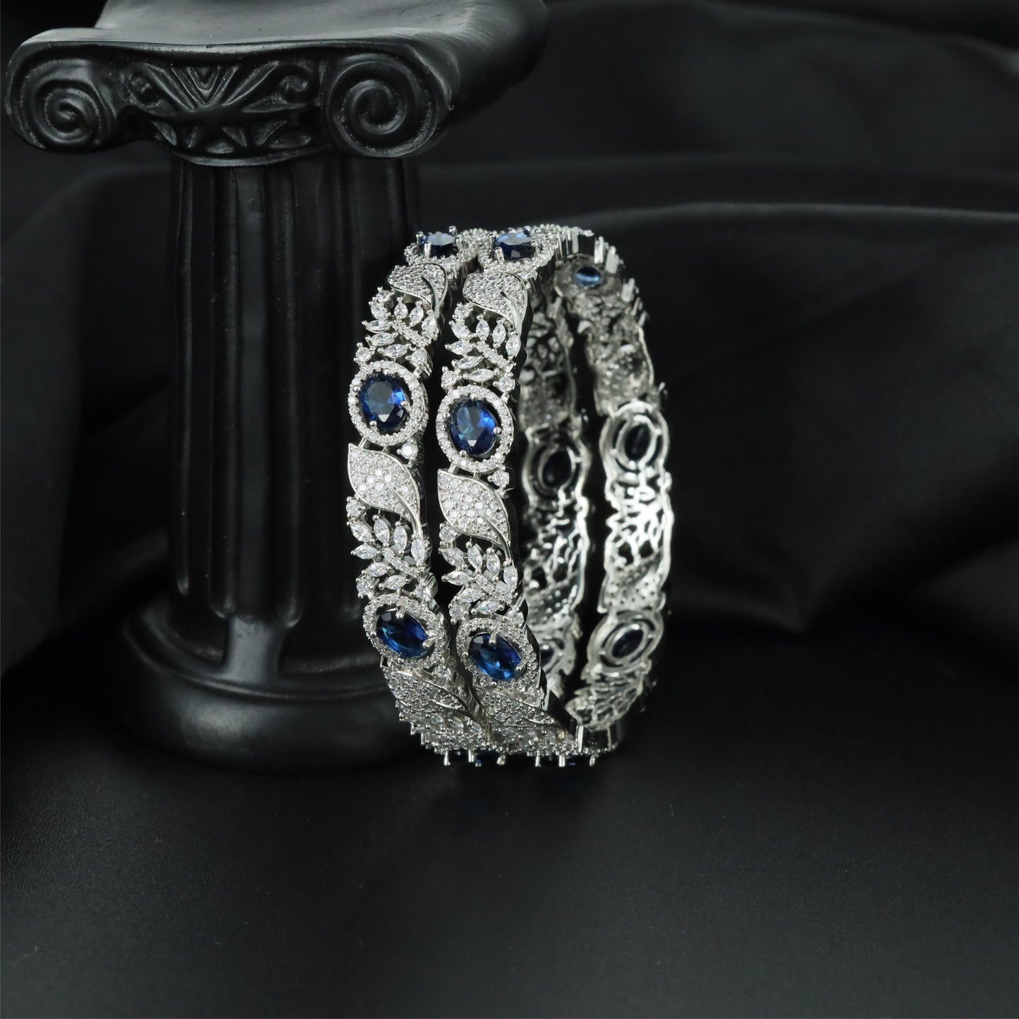 Garden Crest Rhodium Bangles with Flowing Leaf Sections