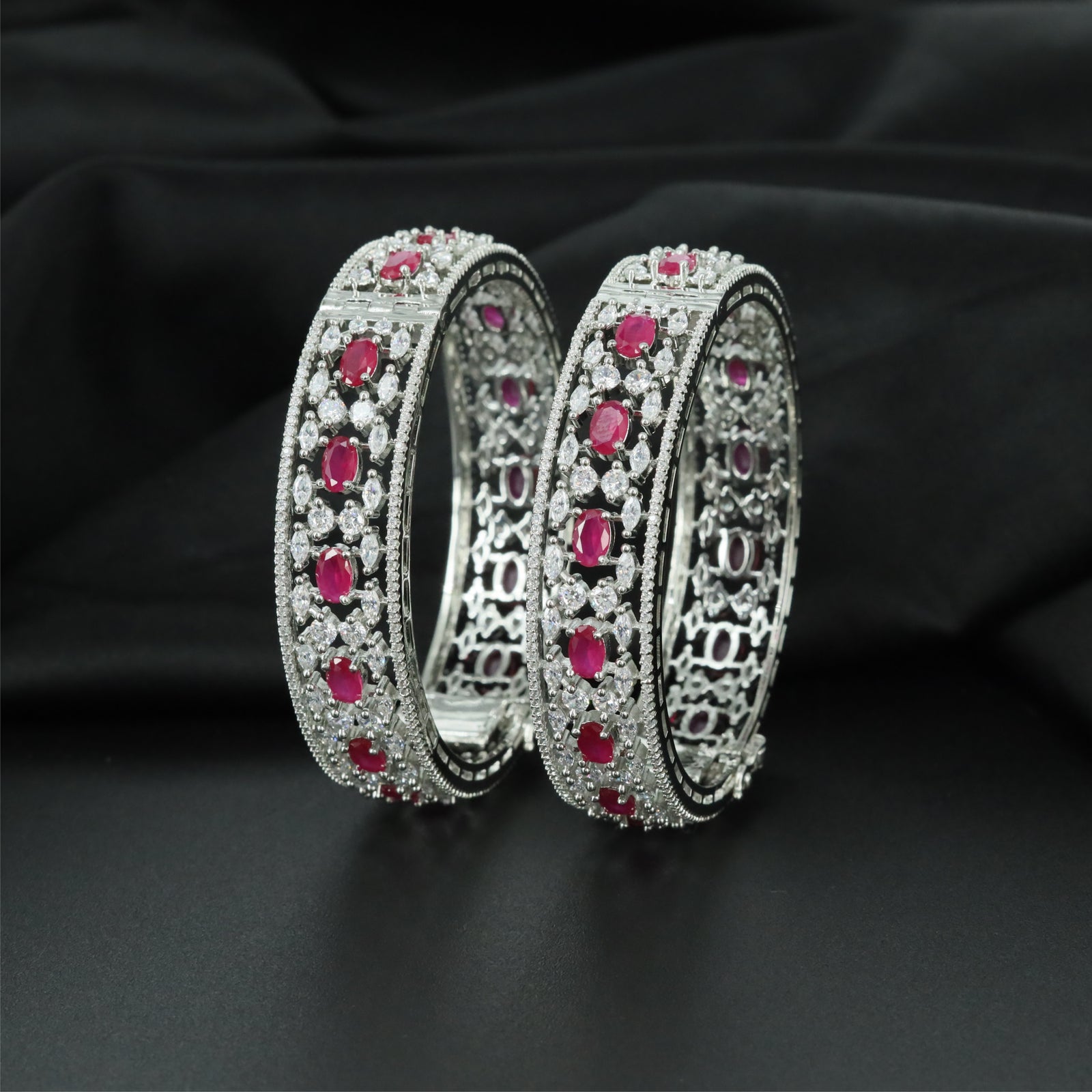 Trellis Accent Rhodium Bangles with Intricate Structural Pattern