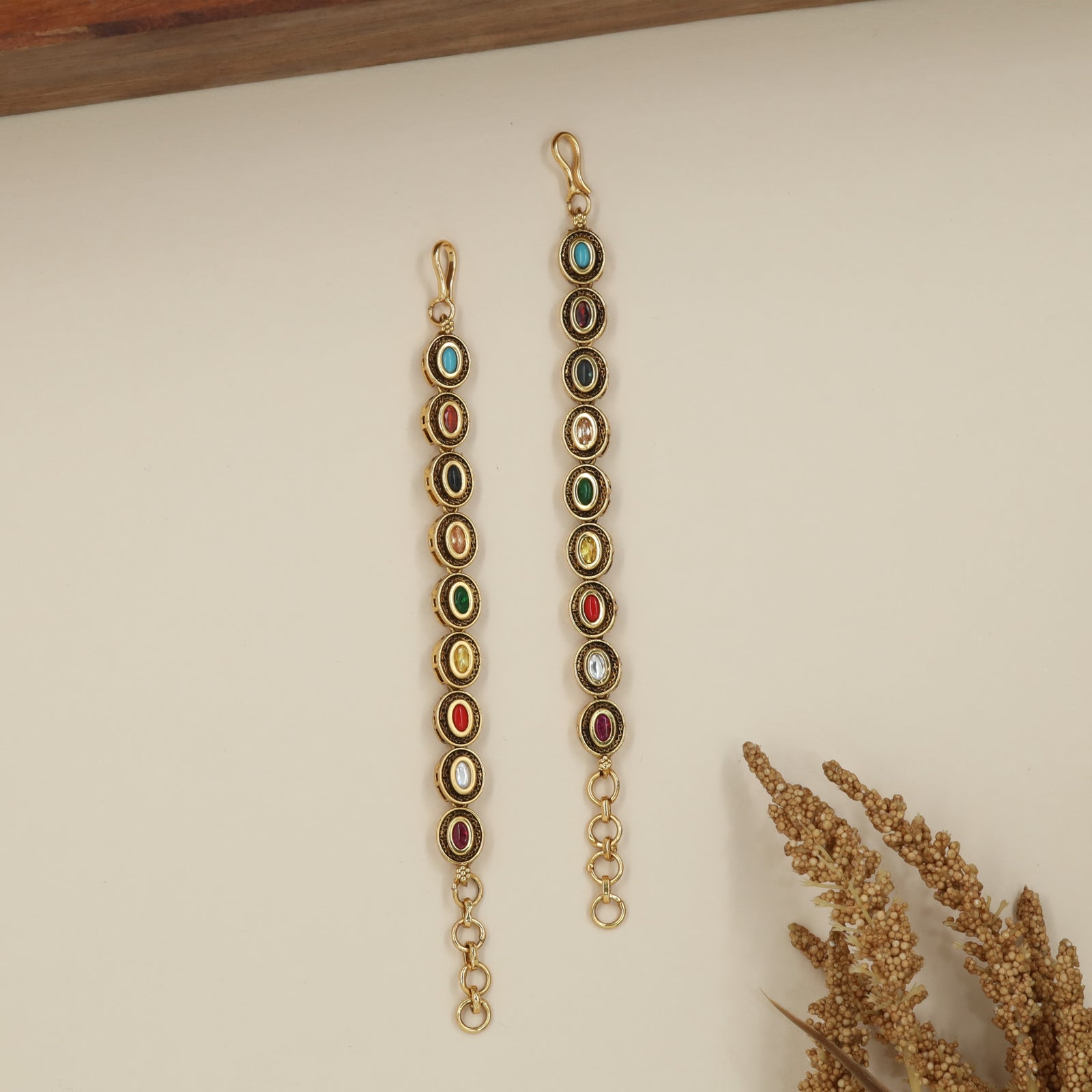 Ornate Vertical Oval Mati with Traditional Connector Design