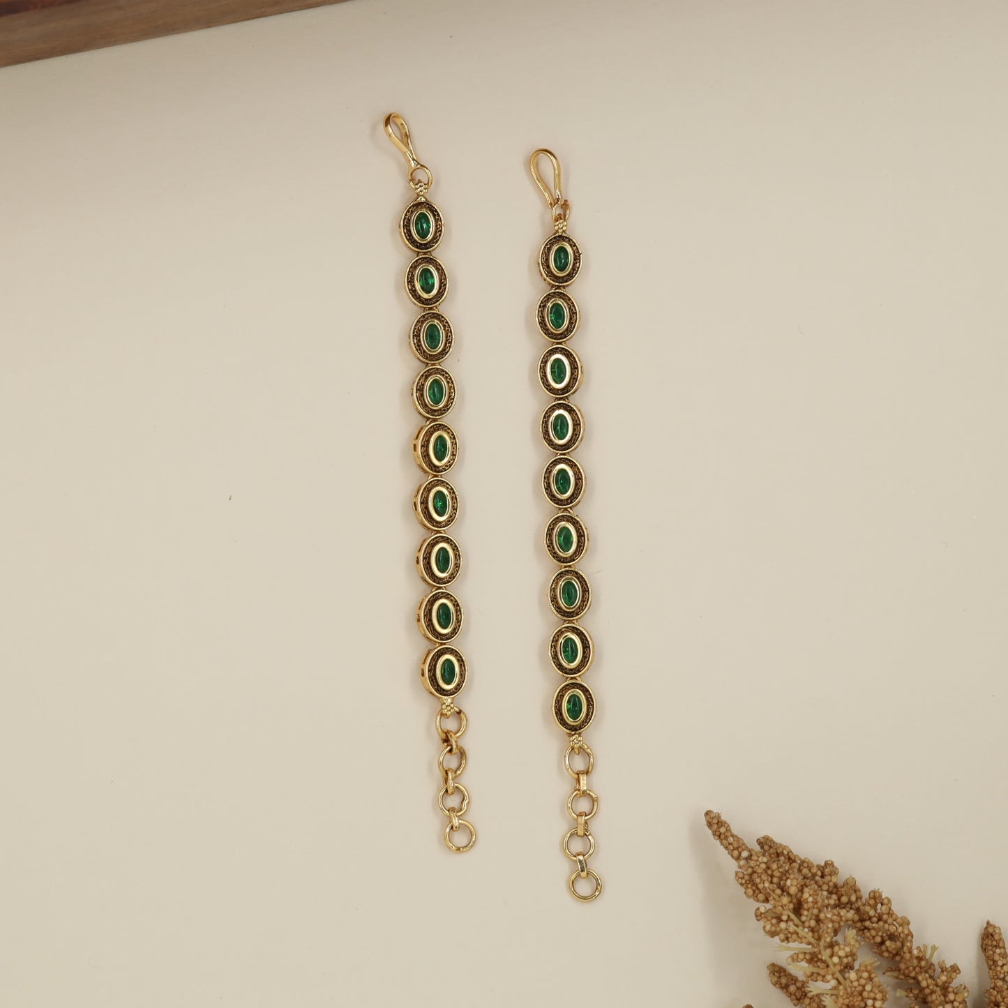 Ornate Vertical Oval Mati with Traditional Connector Design