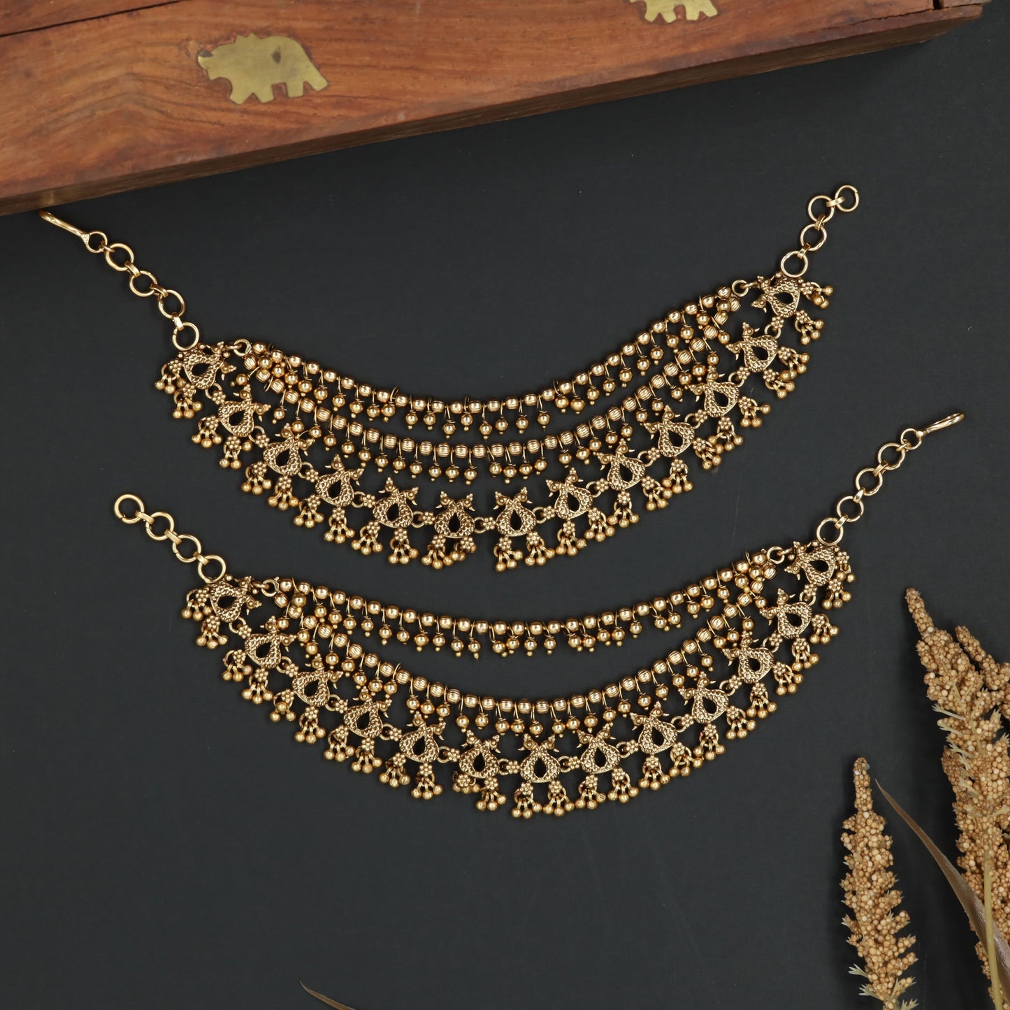 Temple Inspired Mati with Floral Connector Rows and Cascading Details