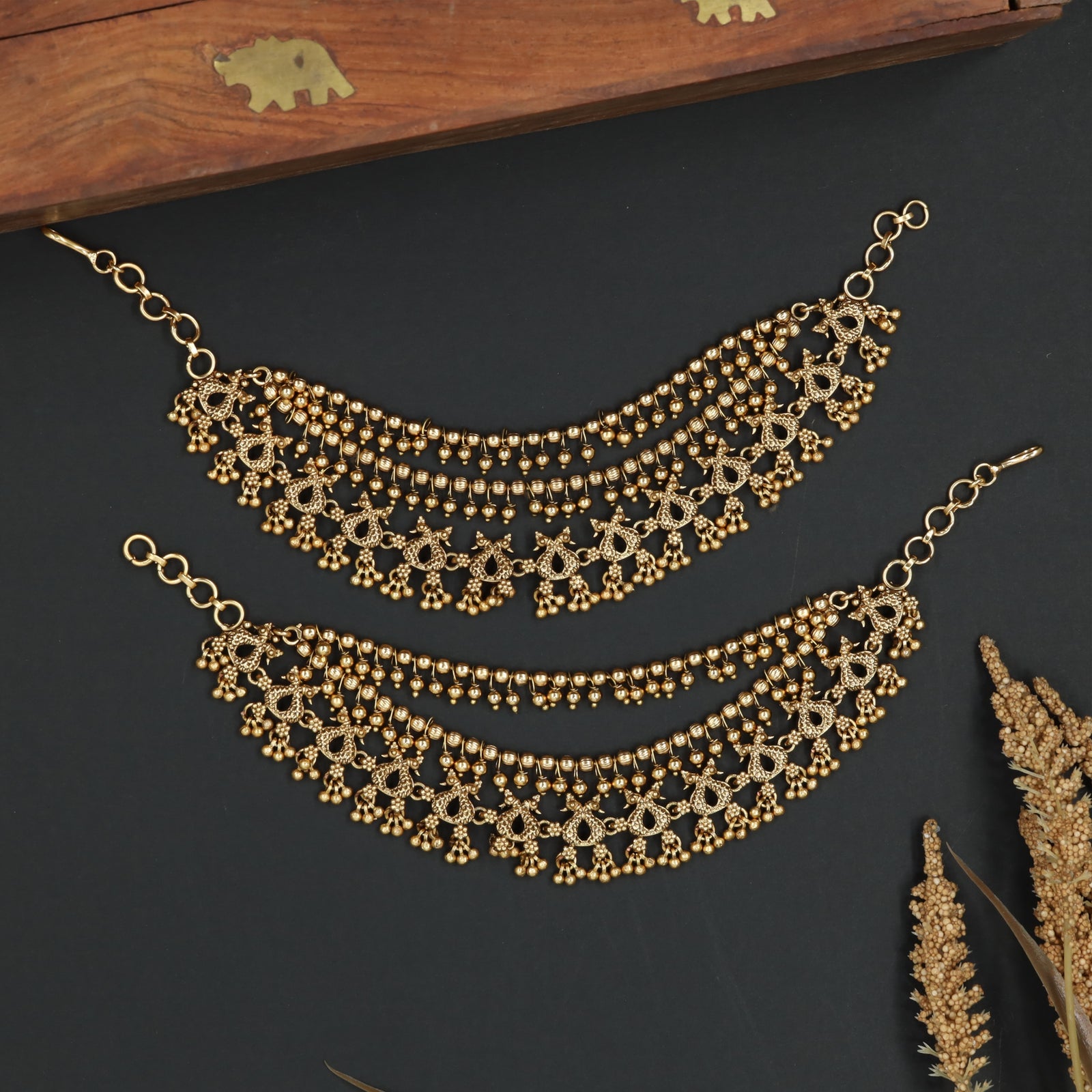 Temple Inspired Mati with Floral Connector Rows and Cascading Details