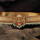 Cross weave antique dabu with central shrine form and clustered bead hangings