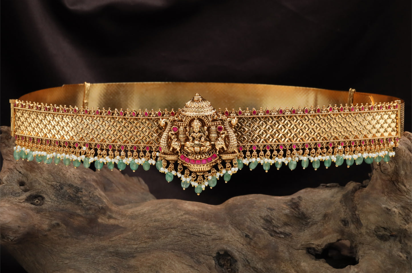 Cross weave antique dabu with central shrine form and clustered bead hangings