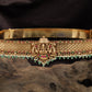 Cross weave antique dabu with central shrine form and clustered bead hangings