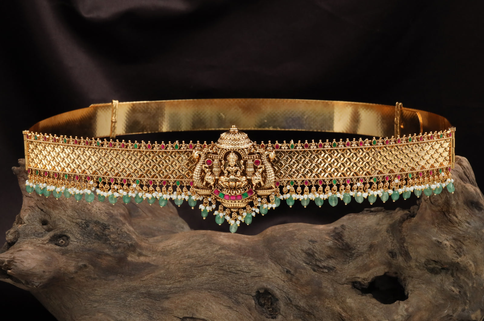 Cross weave antique dabu with central shrine form and clustered bead hangings
