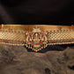 Cross weave antique dabu with central shrine form and clustered bead hangings