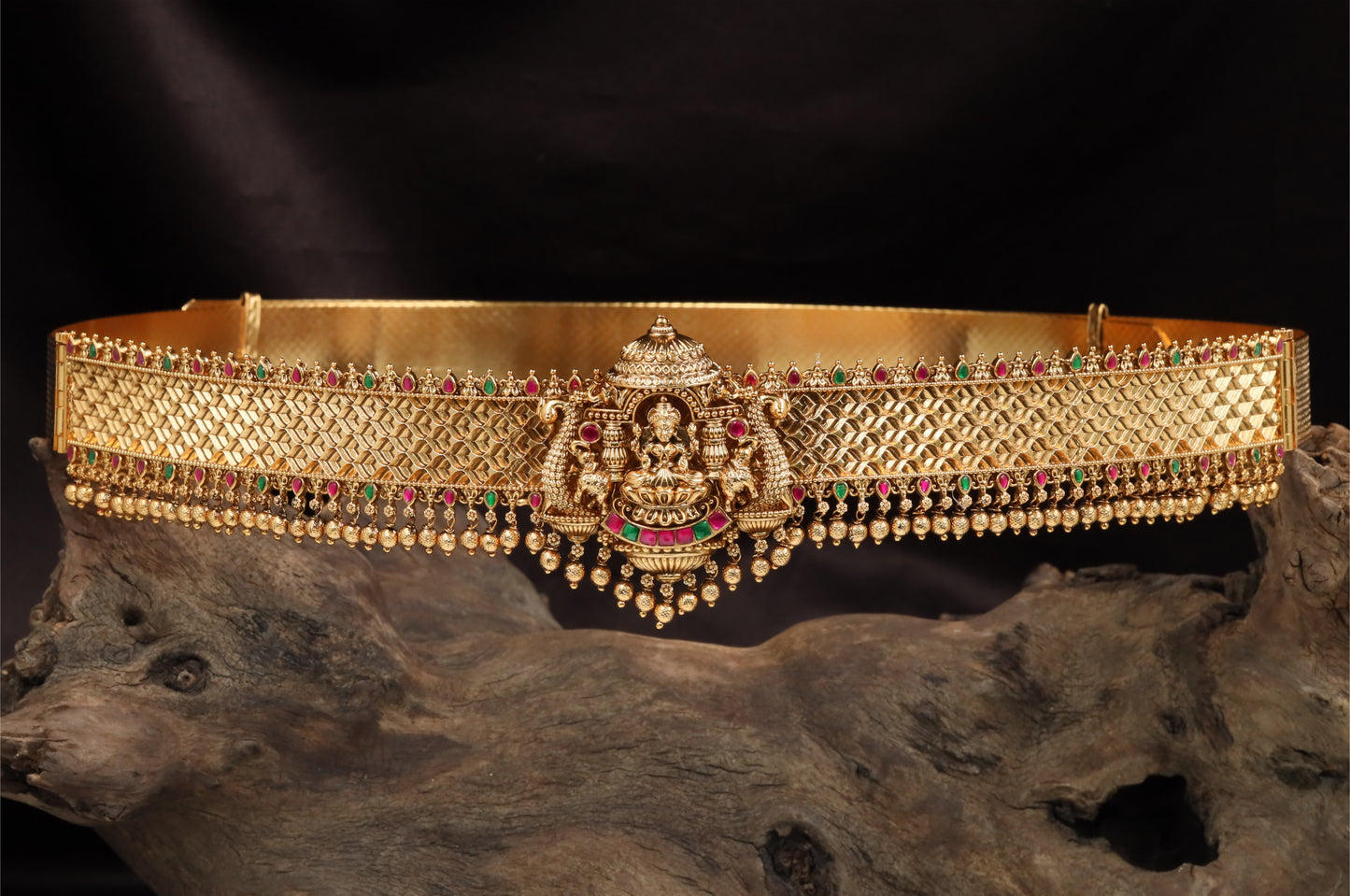 Cross weave antique dabu with central shrine form and clustered bead hangings