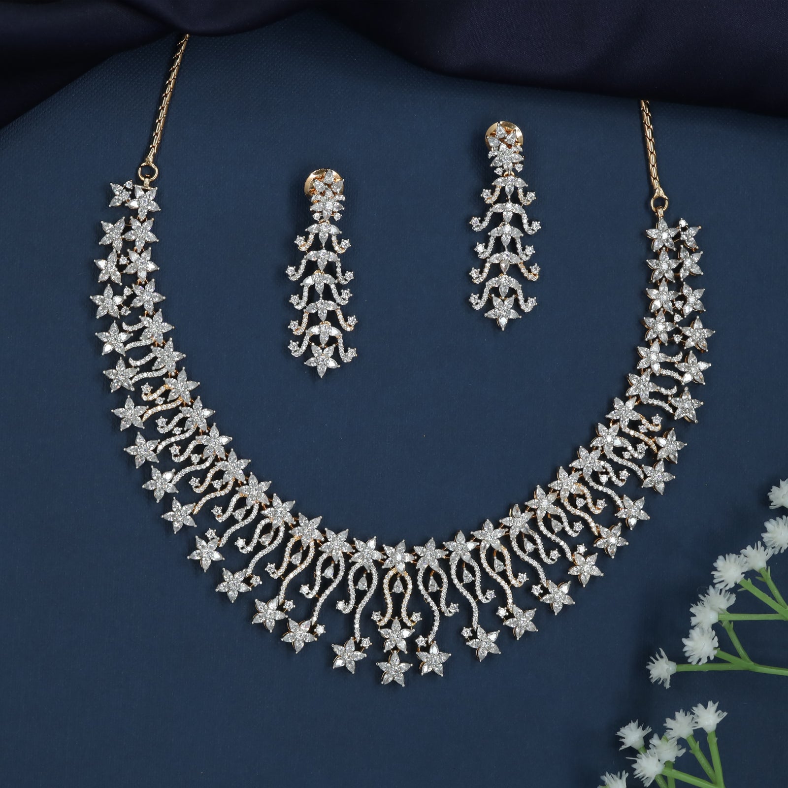 Curved Bloom Necklace with Cascading Star Borders