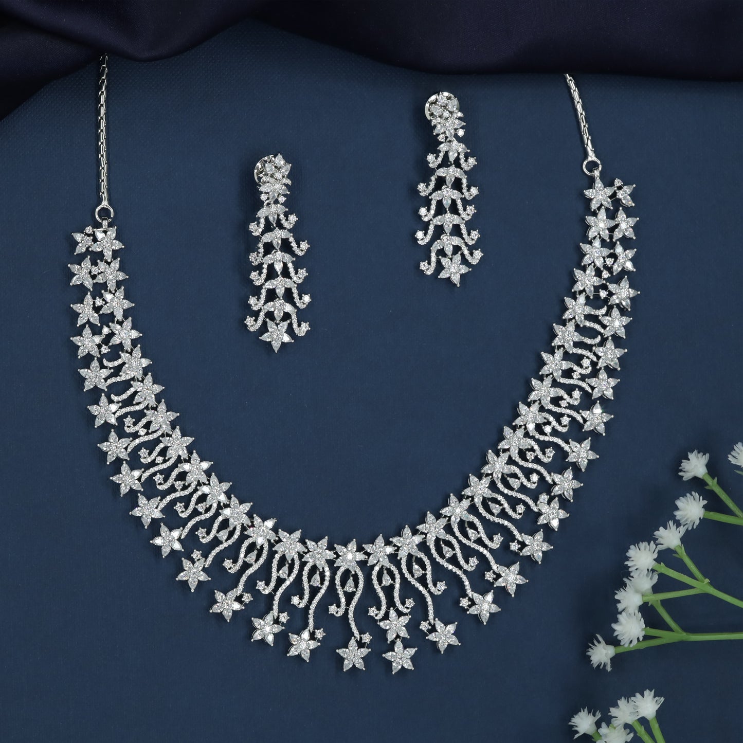 Curved Bloom Necklace with Cascading Star Borders