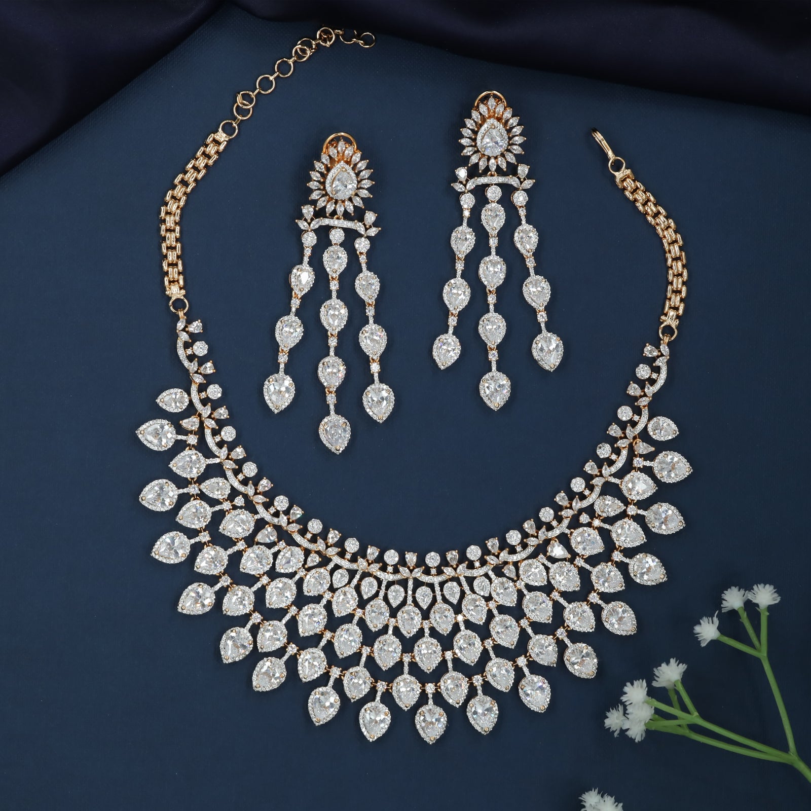 Curved Floral Necklace with Cascading Cluster Pattern