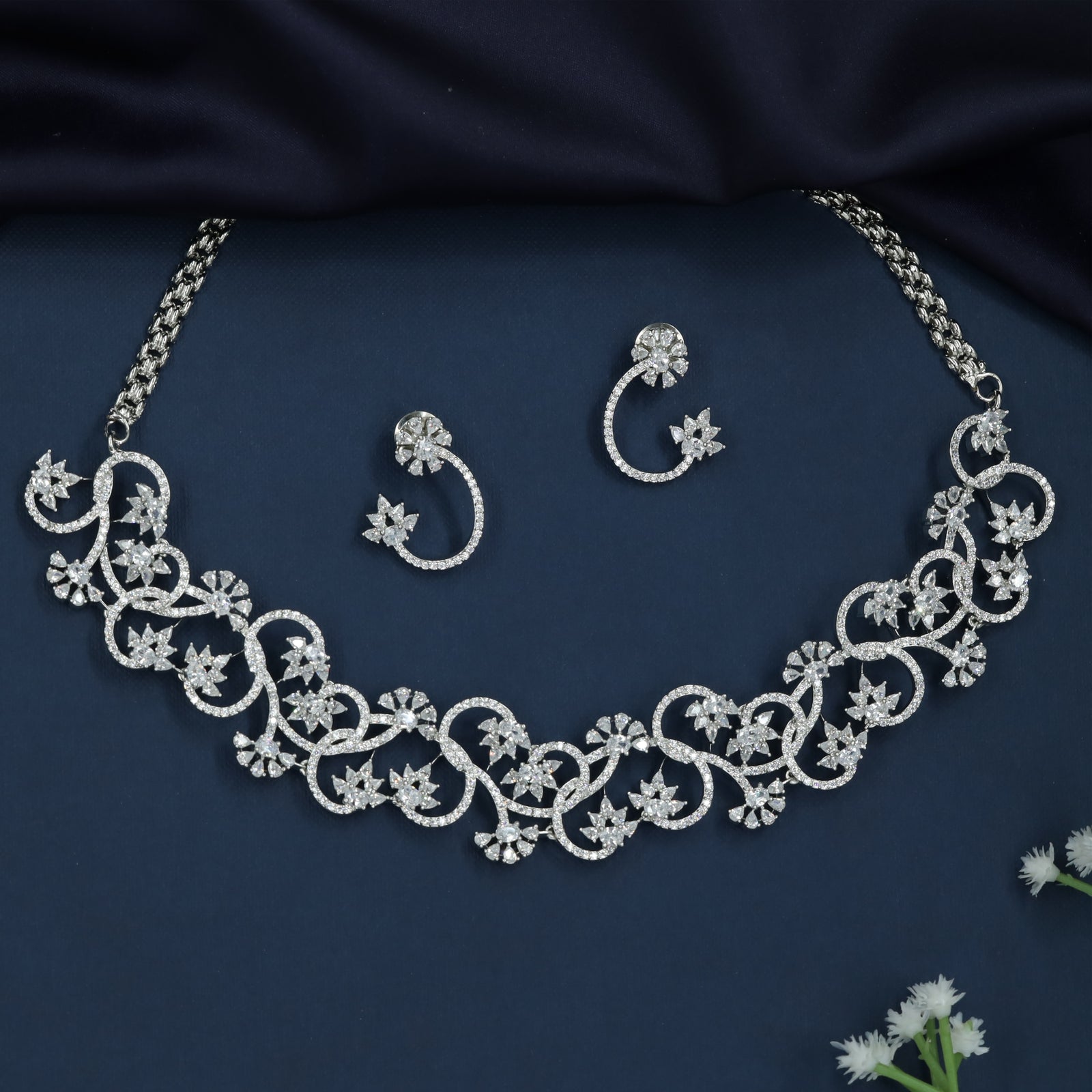Ribbon Swirl Necklace with Cascading Blossom Accents