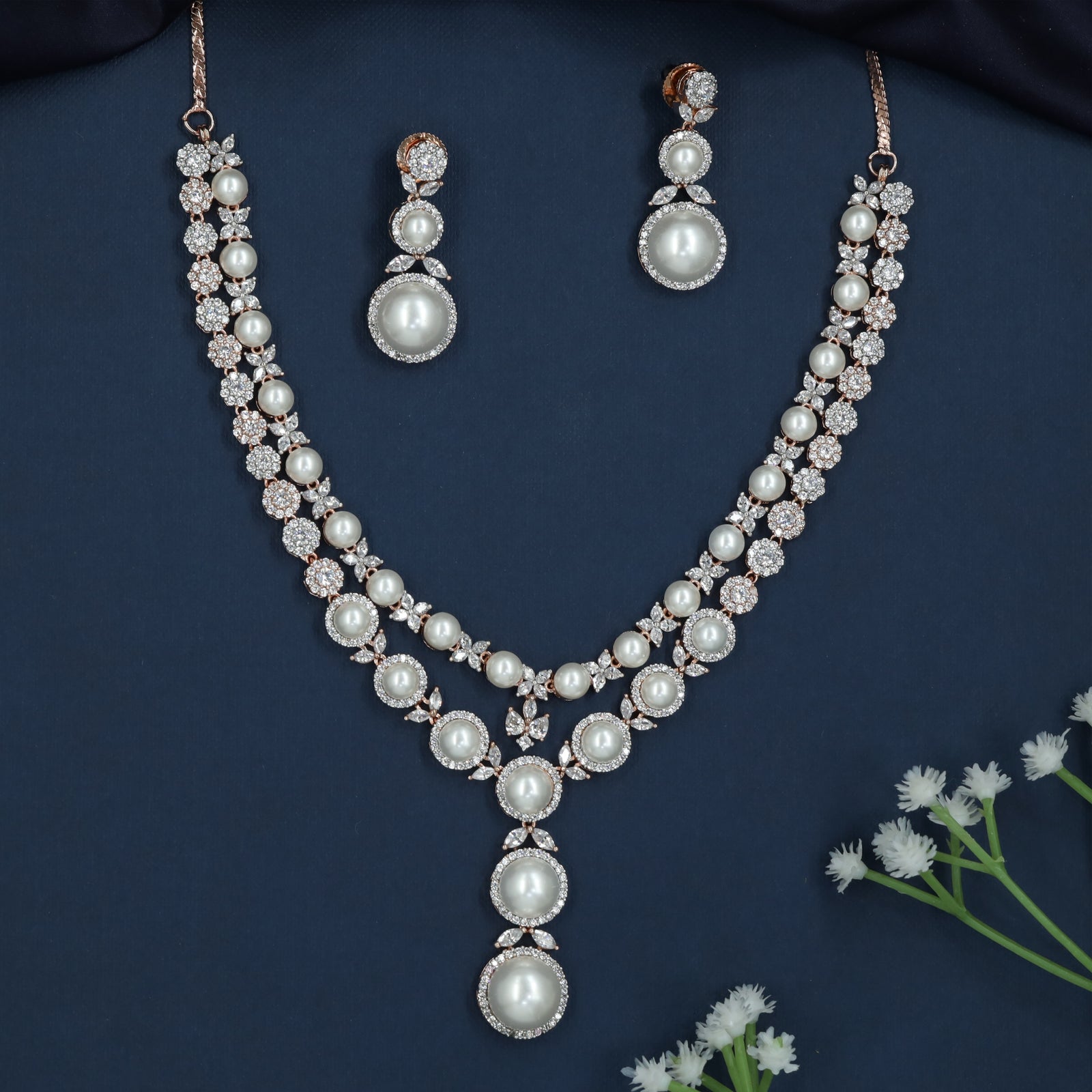 Woven Drop Rose Gold Necklace with Rounded Pendant Formation